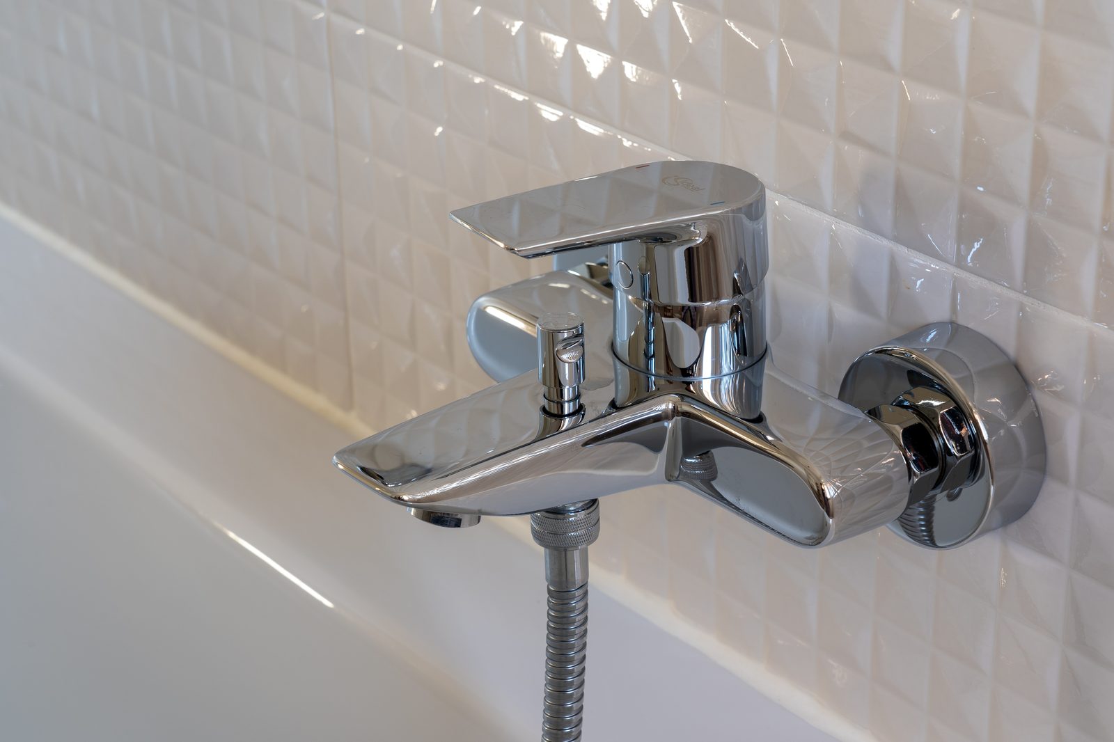 Kitchen sink and mixer installed by Ray & Sons